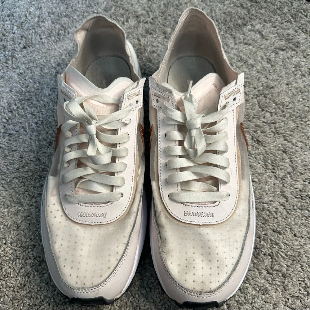 Nike Women's Sneakers in White with Metallic Rose Gold Swoosh